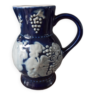 Ceramic pitcher with slips