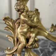 Paire de chenêts en bronze ciselé et doré d'après un modèle de Jacques Caffieri, Paris XIXème