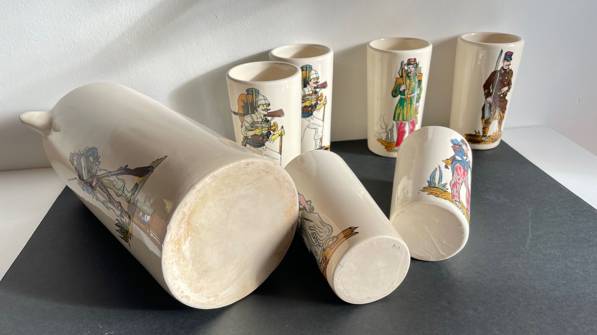 Orangeade service to vintage ceramic soldiers