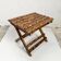 Small folding stool in exotic wood