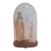 glass cloche with ancient religious statues – Christ King Pier