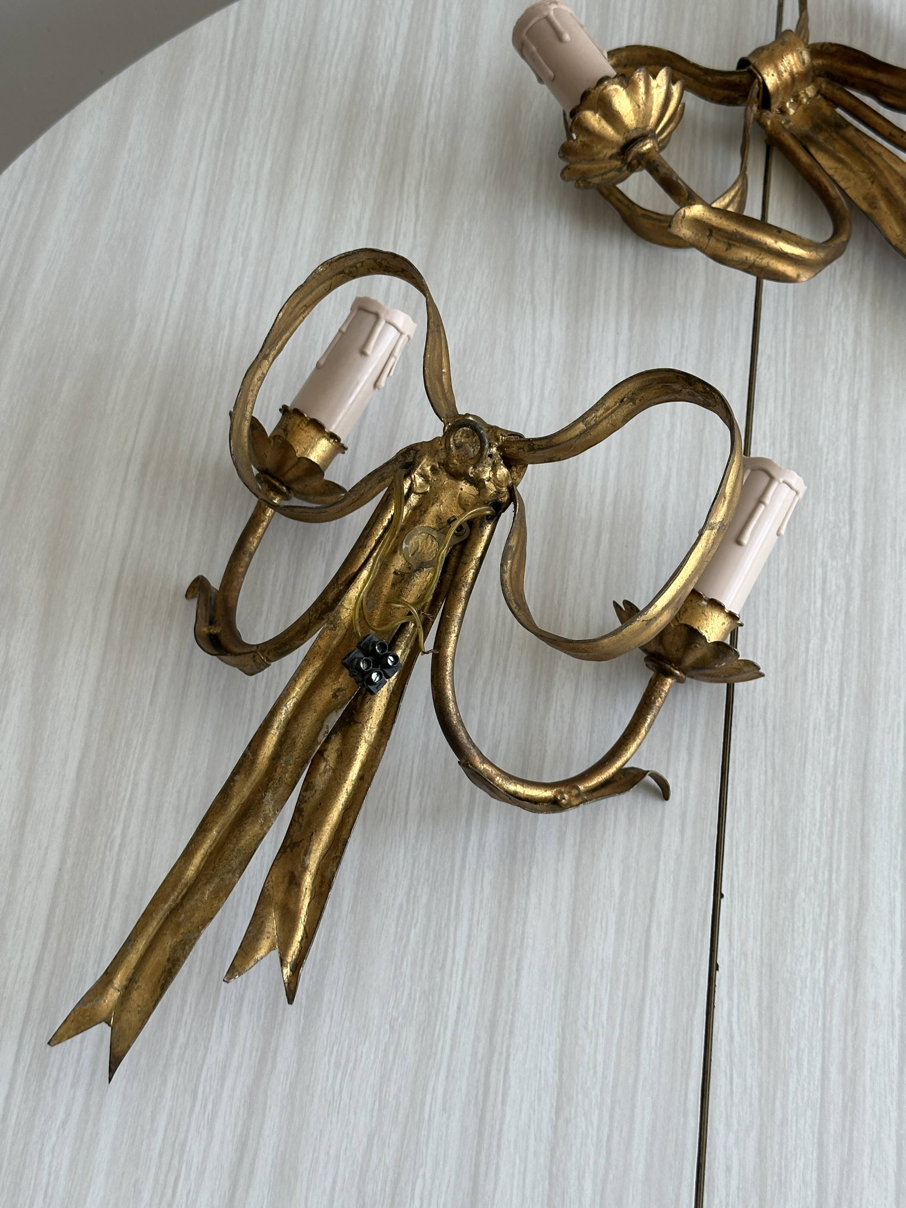 pair of antique metal wall lights