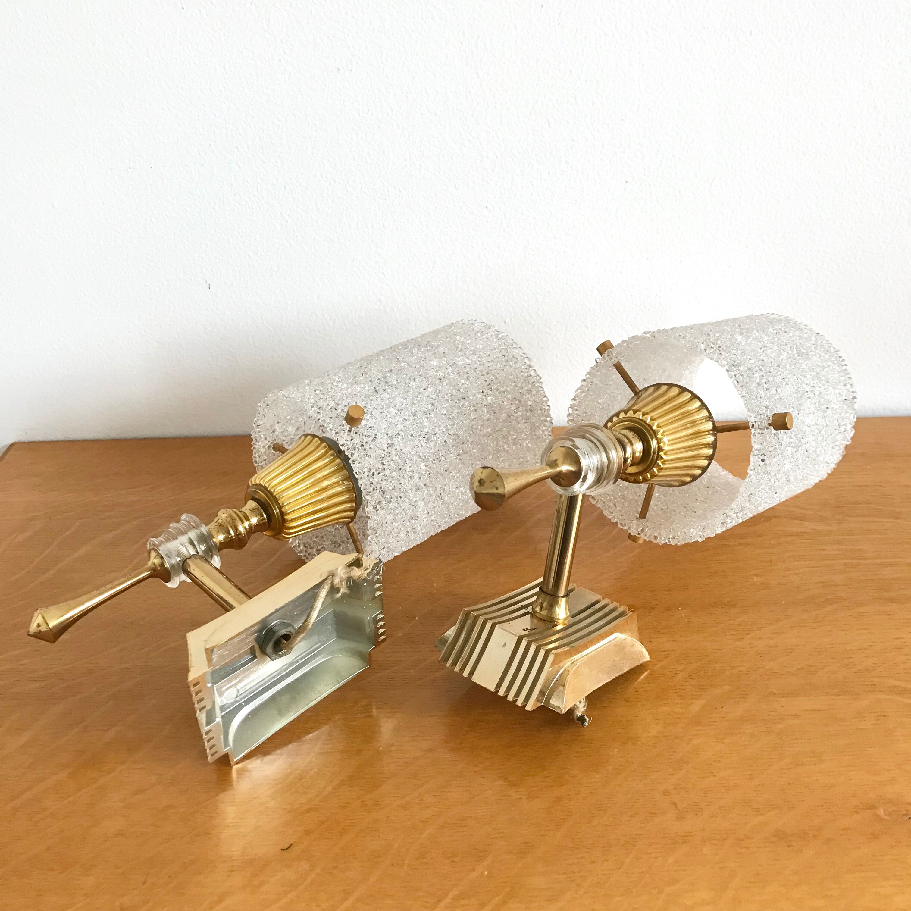 Pair of sconces in gold metal and plexi granita