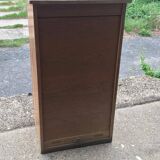 Brown lacquered wooden industrial cabinet with sliding curtain, 1950s, Czech Republic.