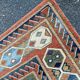 Large oriental wool rug with terracotta geometric patterns 200x300cm