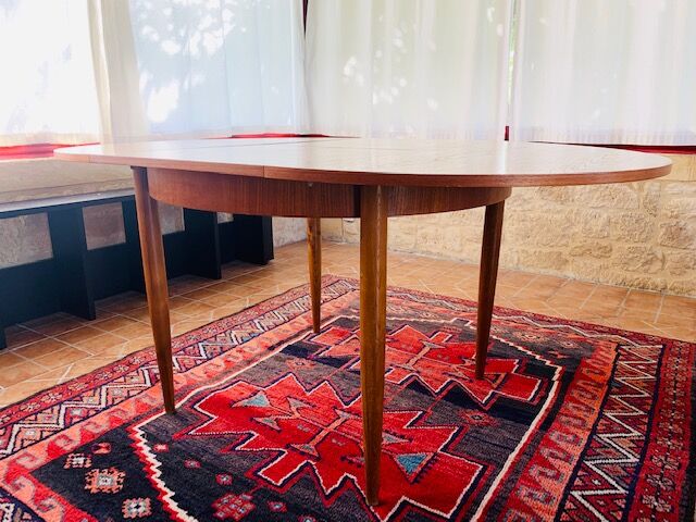Expandable teak dining table, butterfly extension, circa 60s