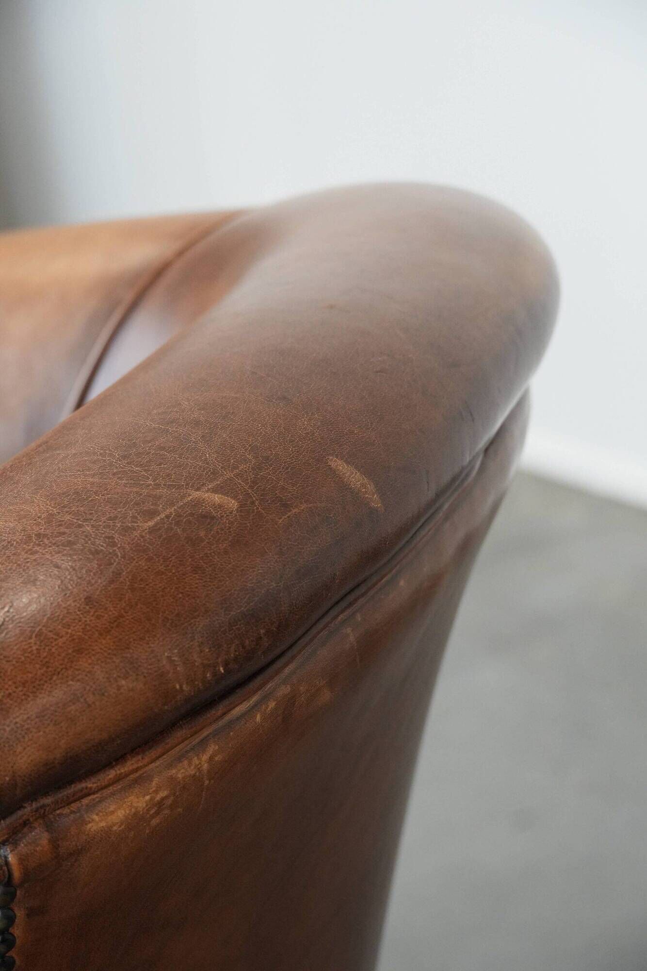 Comfortable club chair made of sheepskin leather