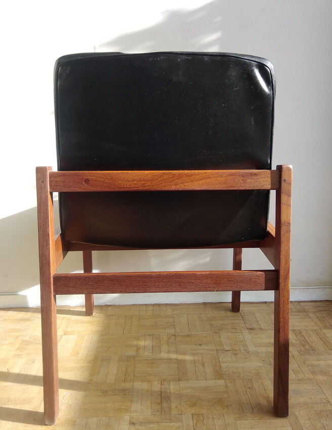 Massive teak and black skai armchair from the 1960s