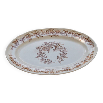 Oval dish from the 19th century in ironstone signed Longchamp "Liserons"
