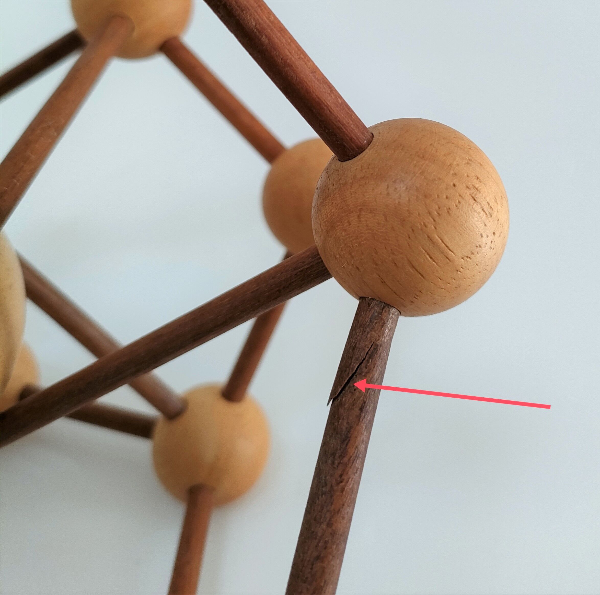 Sculptural modeling of a solid wood atom contemporary design