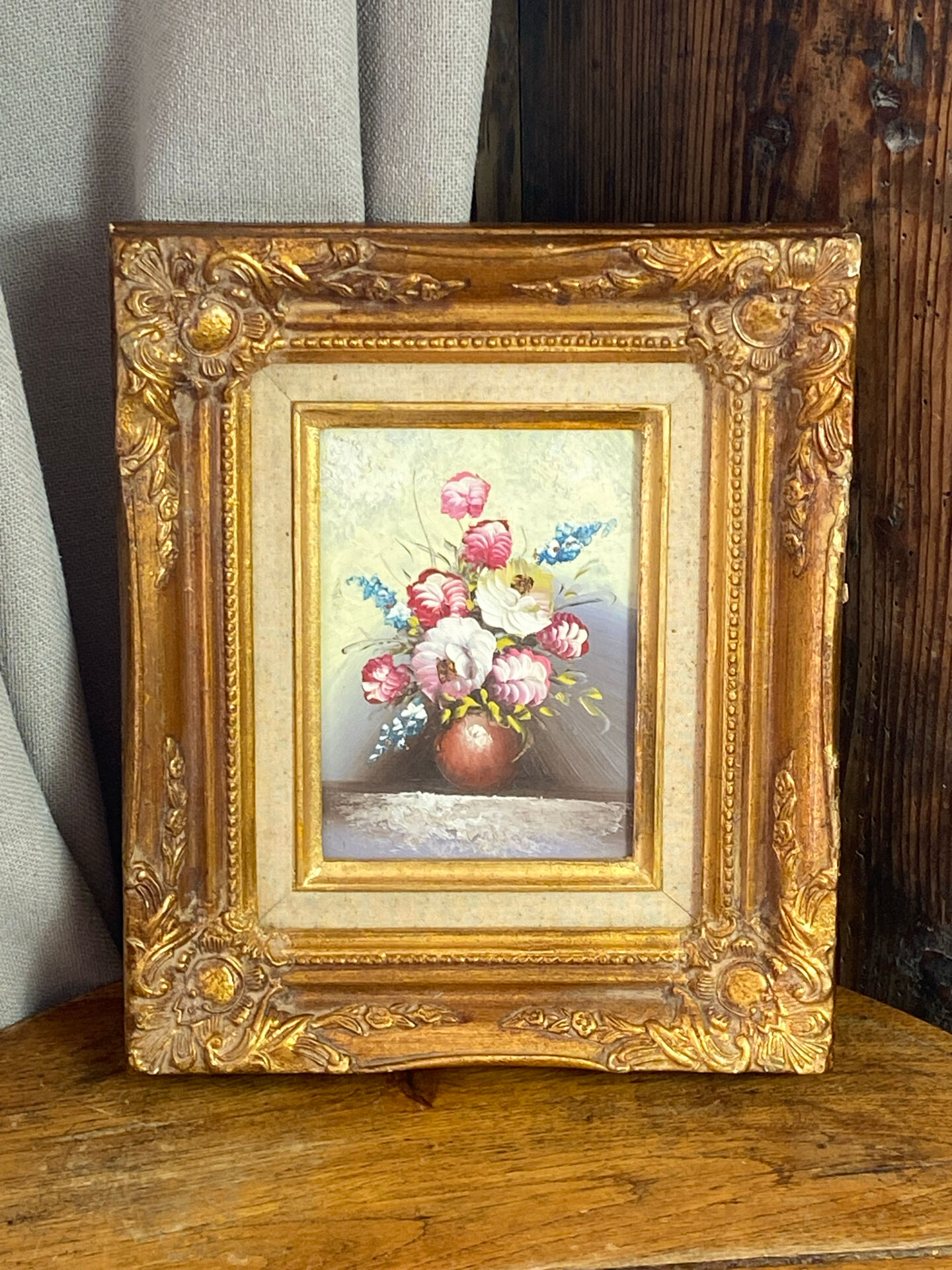 Still life, painting on hardboard, wooden and stucco frame.