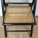 Pair of wooden and rattan folding chairs