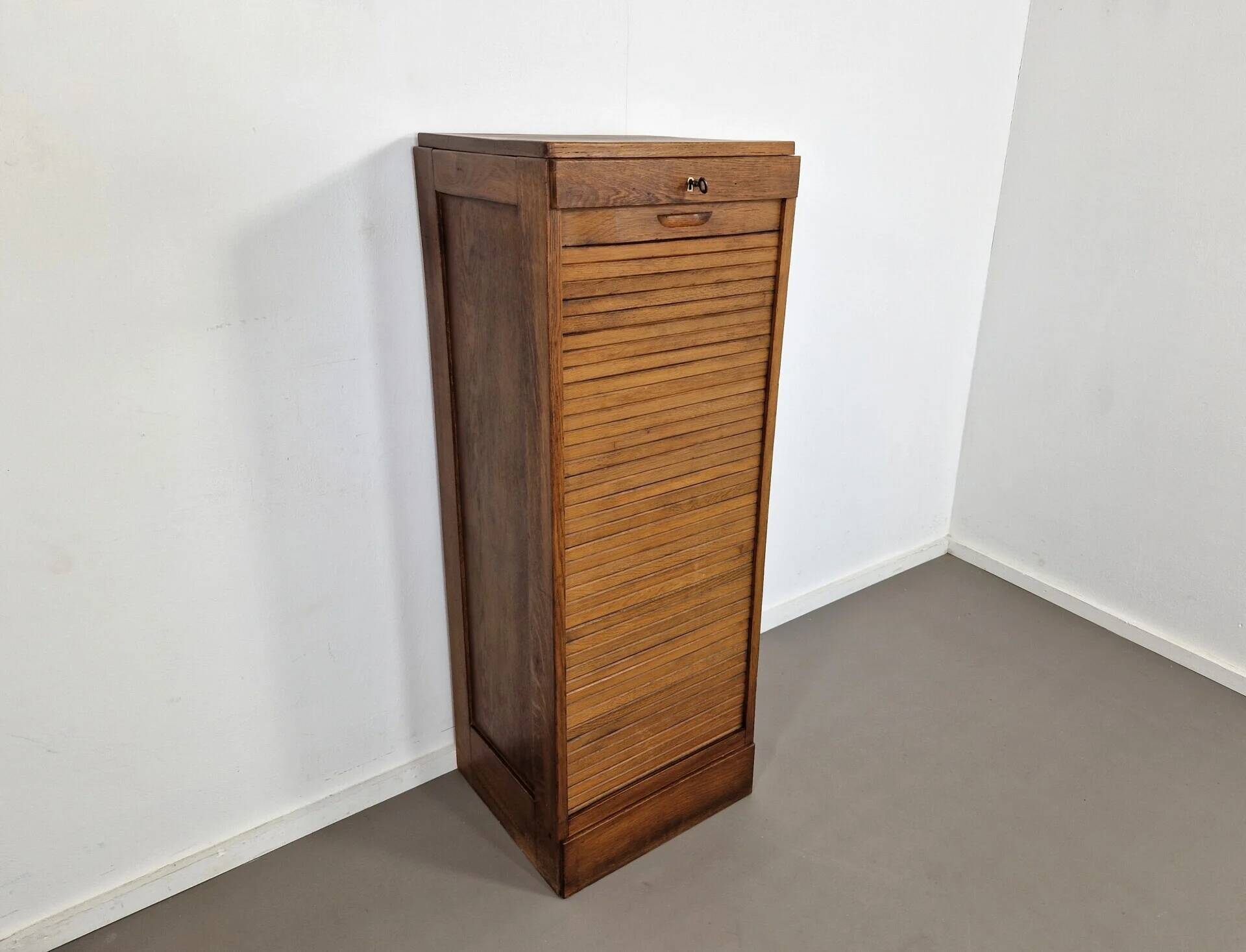 Vintage large oak shutter cabinet | 1930s