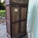 Breton cabinet with carved characters of the early 20th century with 2 doors and 1 oak drawer.