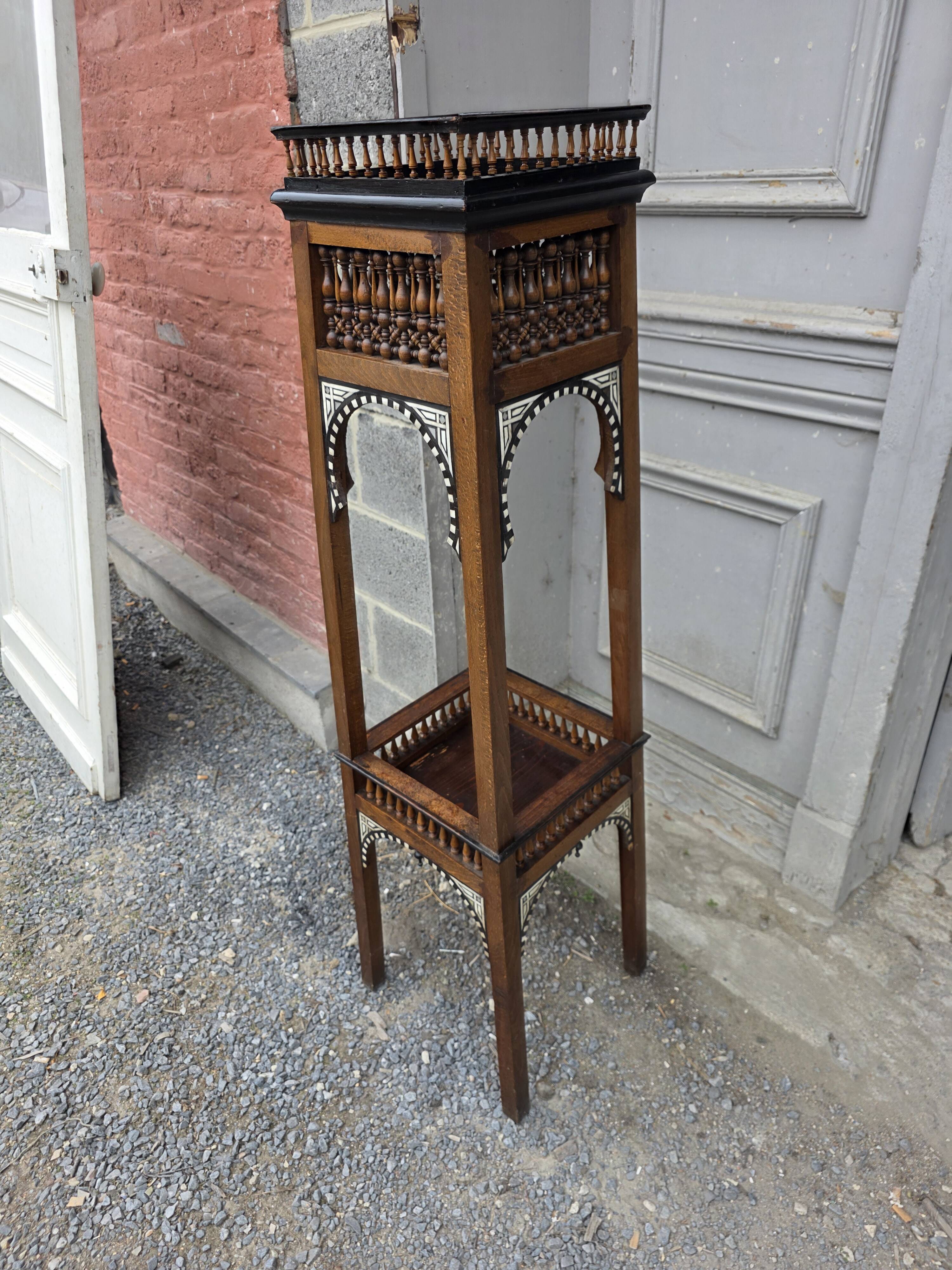 Antique pedestal from the early 20th century.