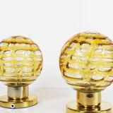 Pair of vintage amber glass and brass metal wall lamps by Doria