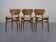 Dining chairs in walnut and beech, 1960s, set of 3.