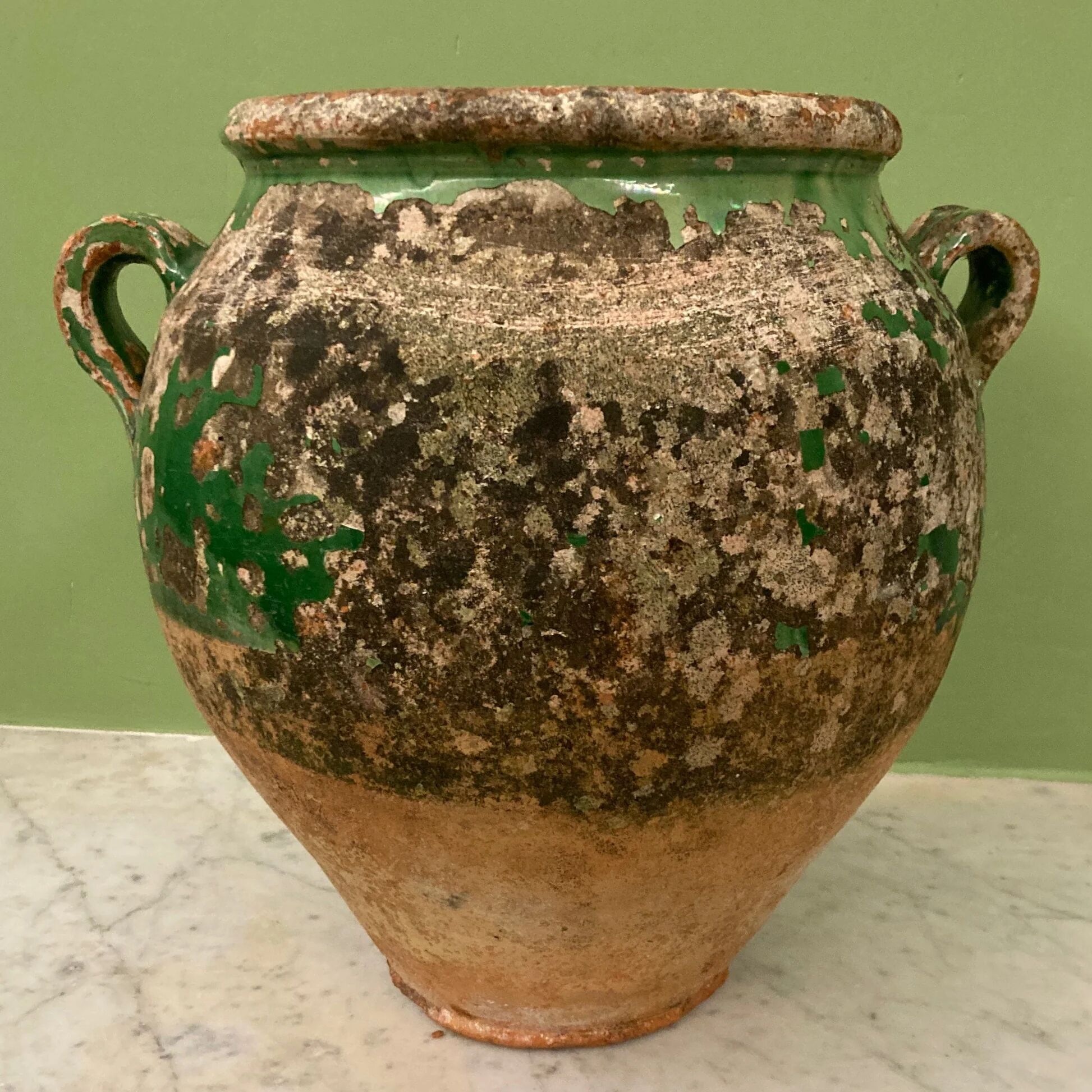 19th-century confit pot. Glazed green terracotta.