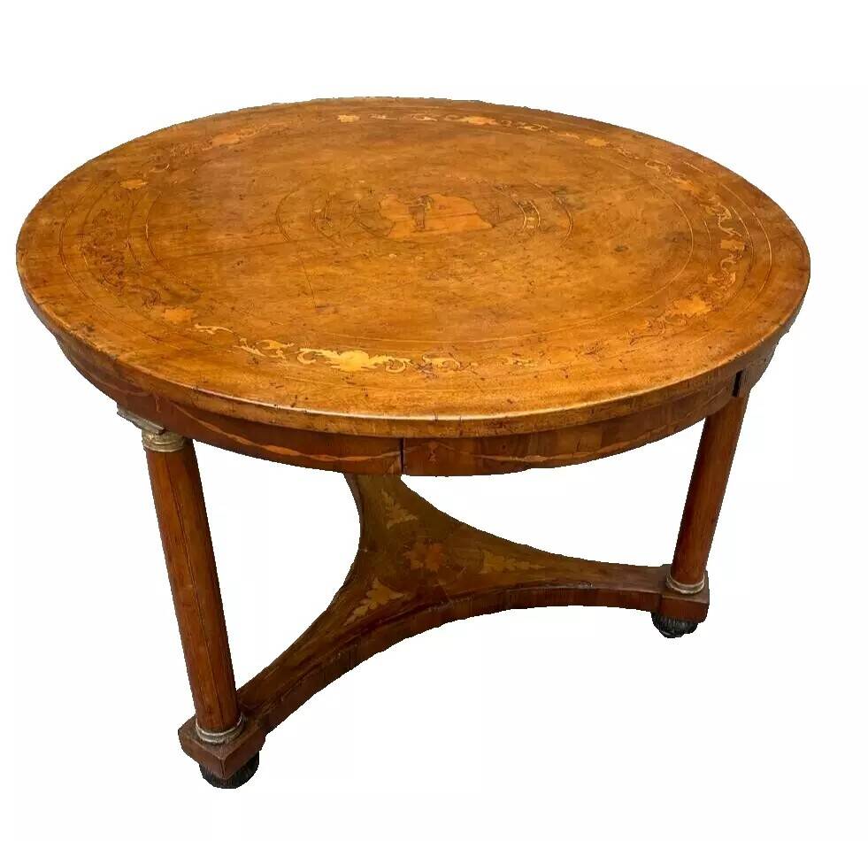 Antique round marquetry Empire table from the early 19th century