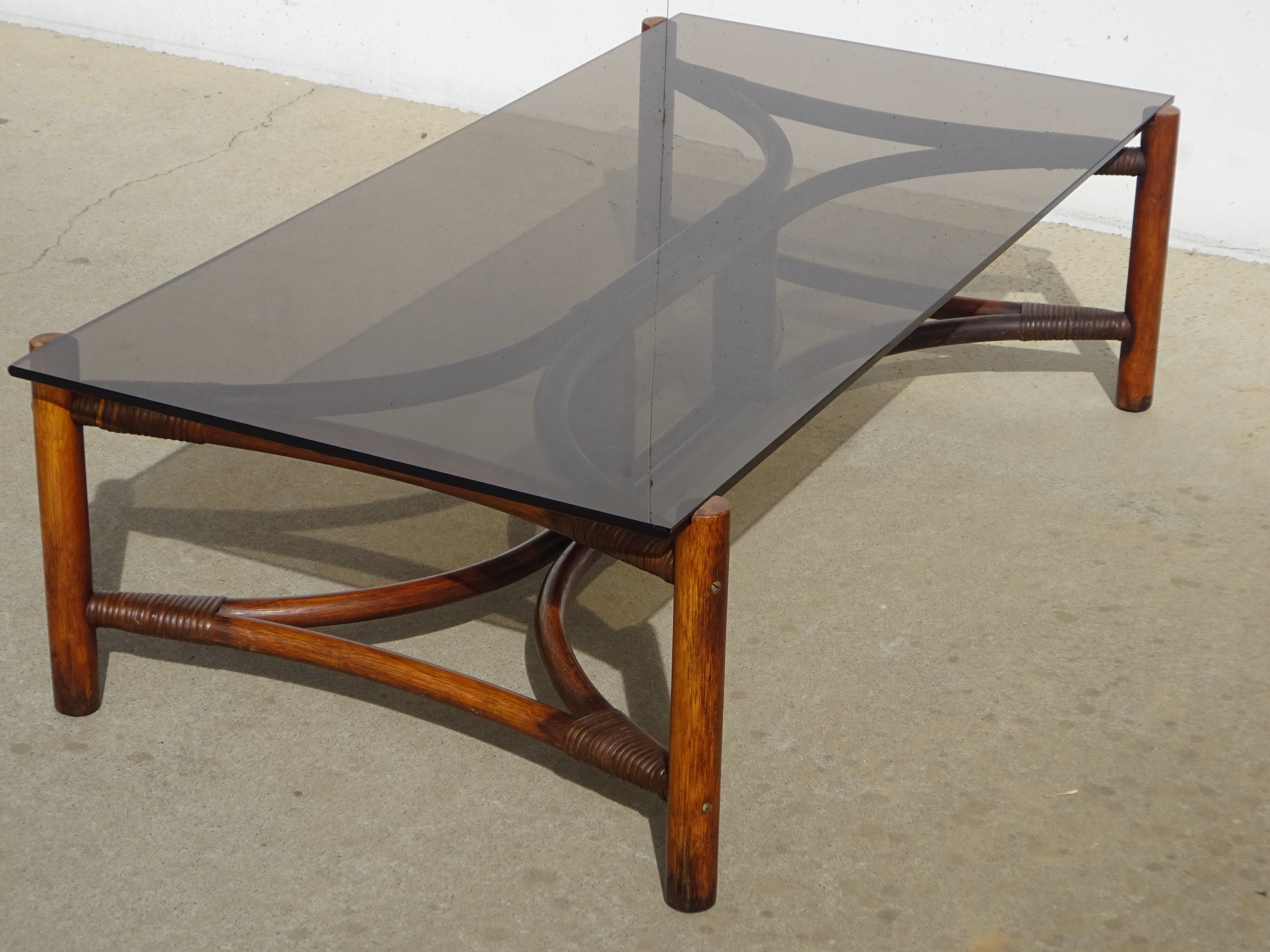 Glass and rattan coffee table