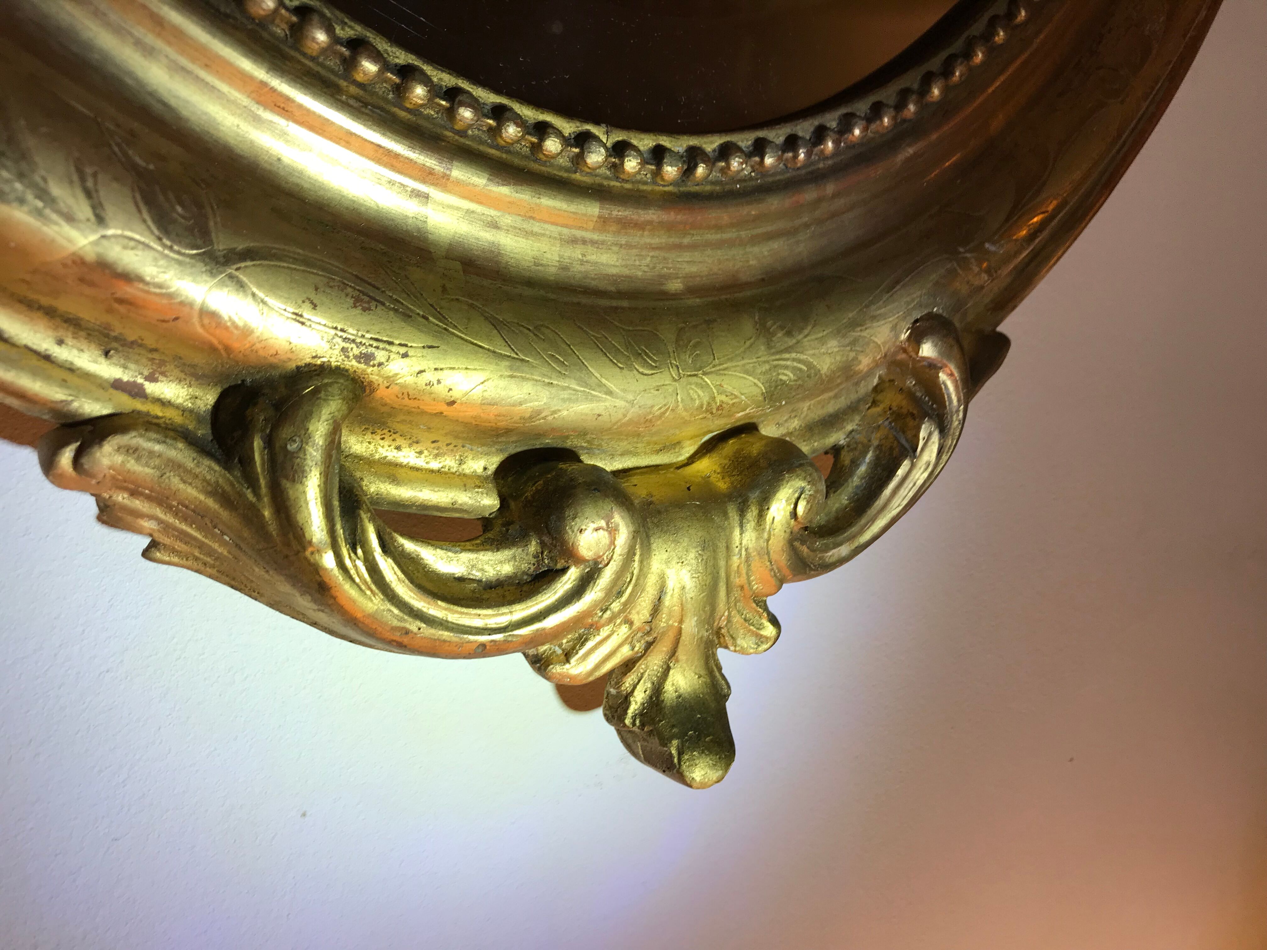 Oval mirror Louis XVI gold leaf