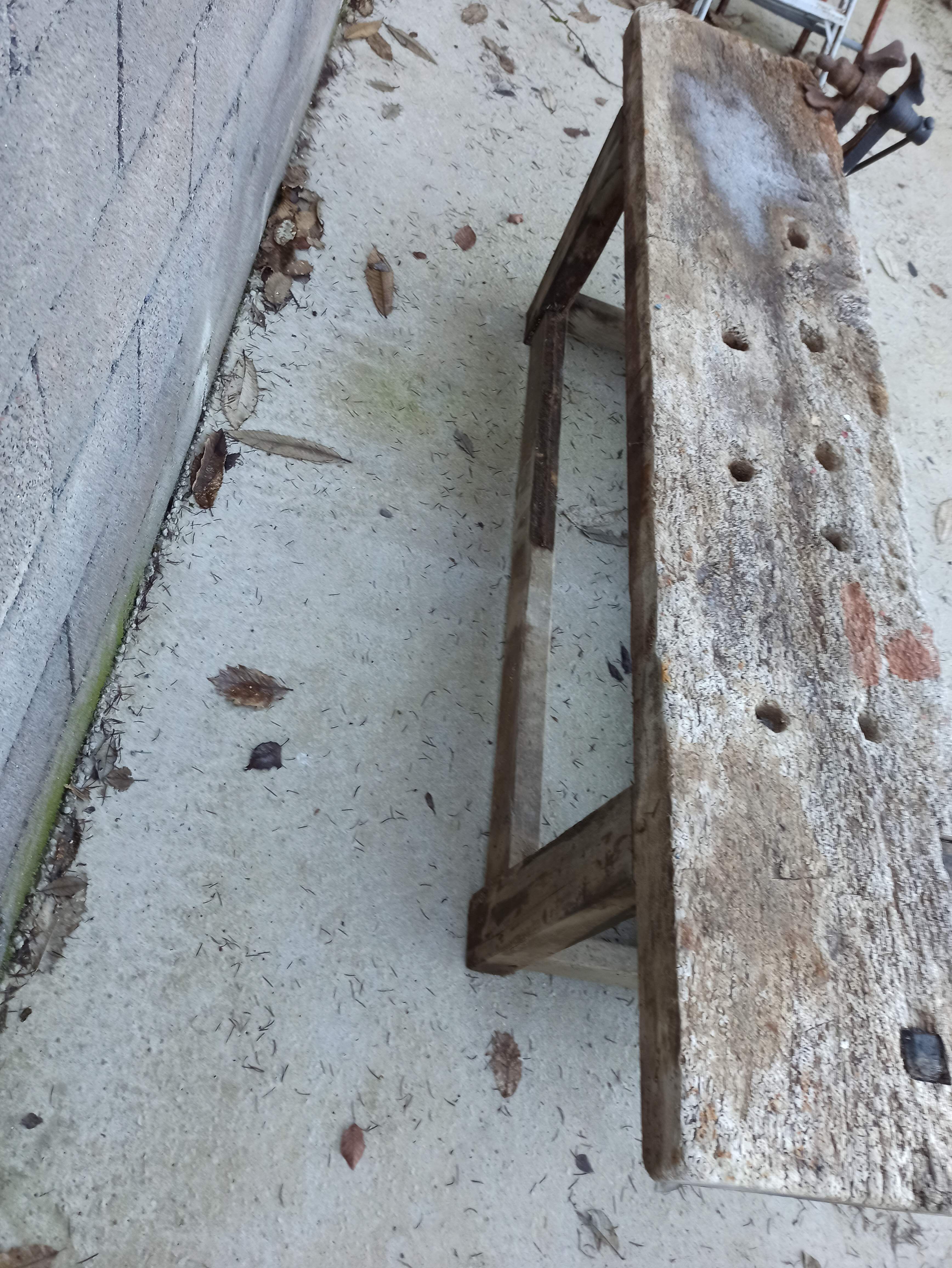 Wooden carpenter's workbench with iron and wooden vice