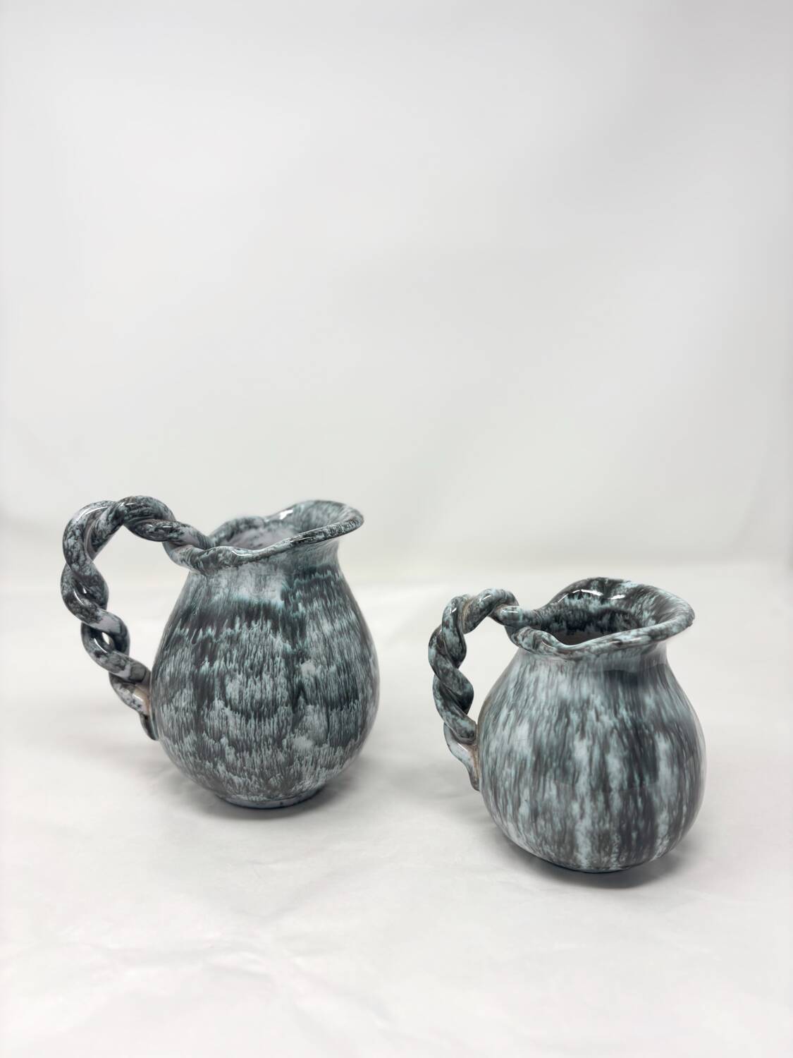 Set of 2 Alexandre art deco ceramic pitchers