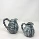 Set of 2 Alexandre art deco ceramic pitchers