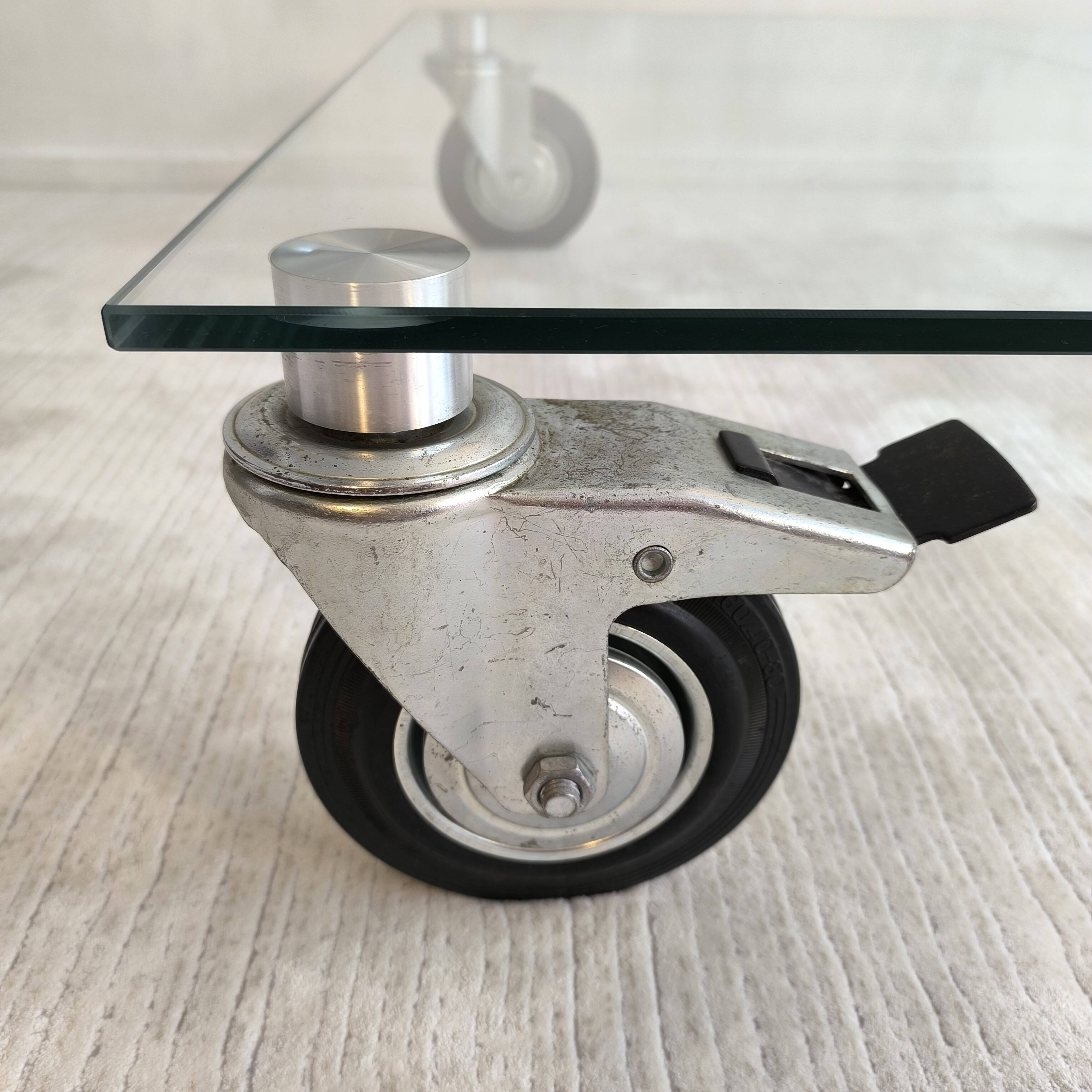 Beautiful designer glass coffee table on wheels