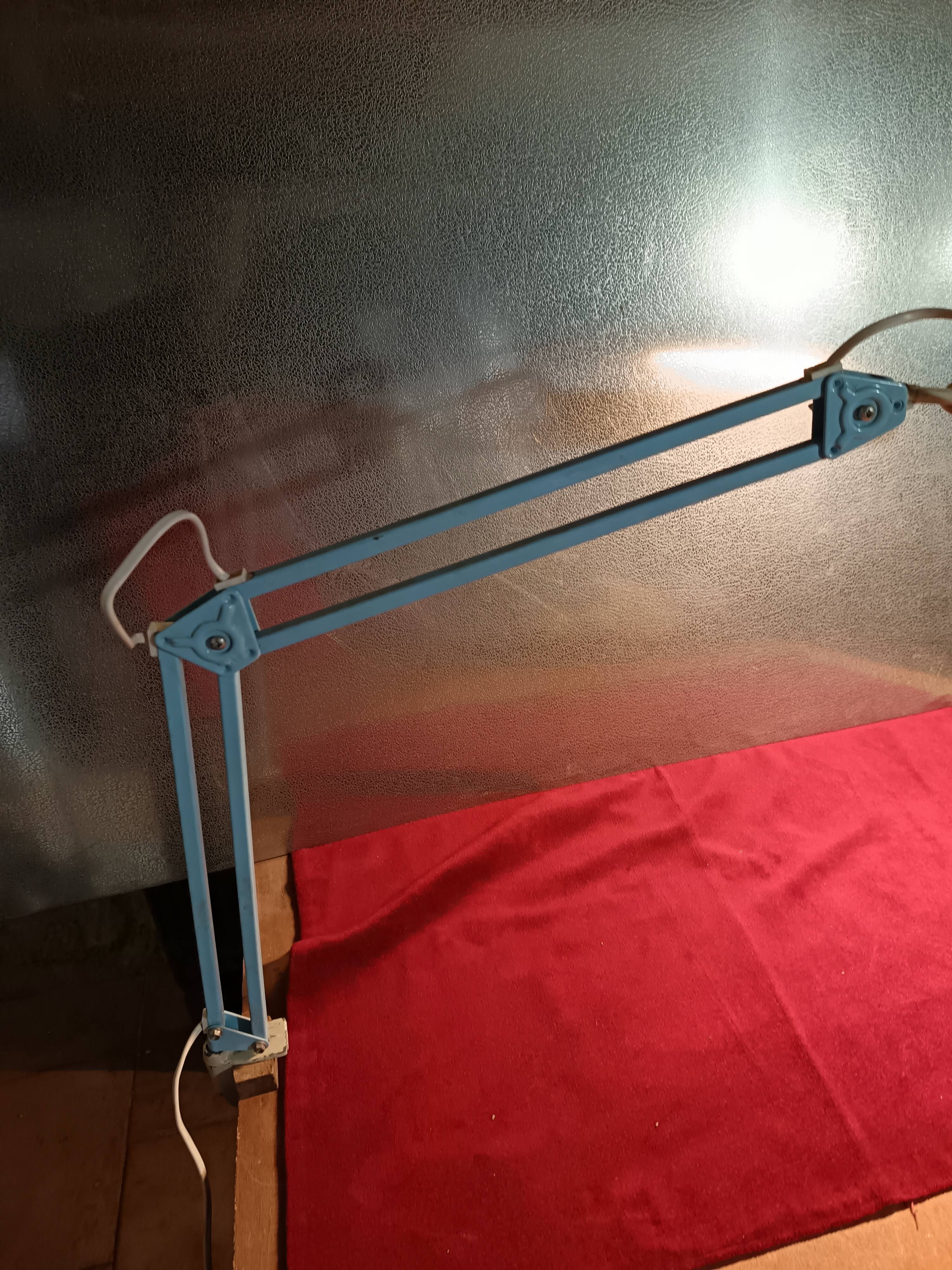 Articulated blue desk lamp