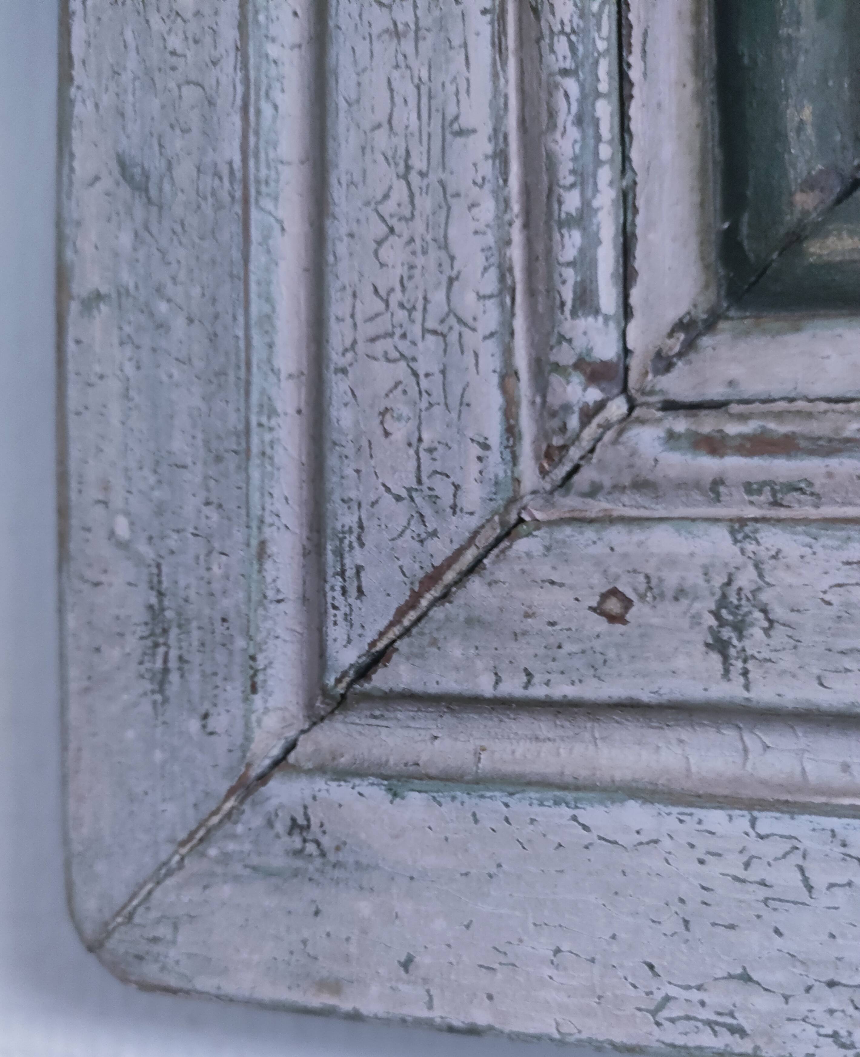 Beveled mirror patinated wood early 20th century