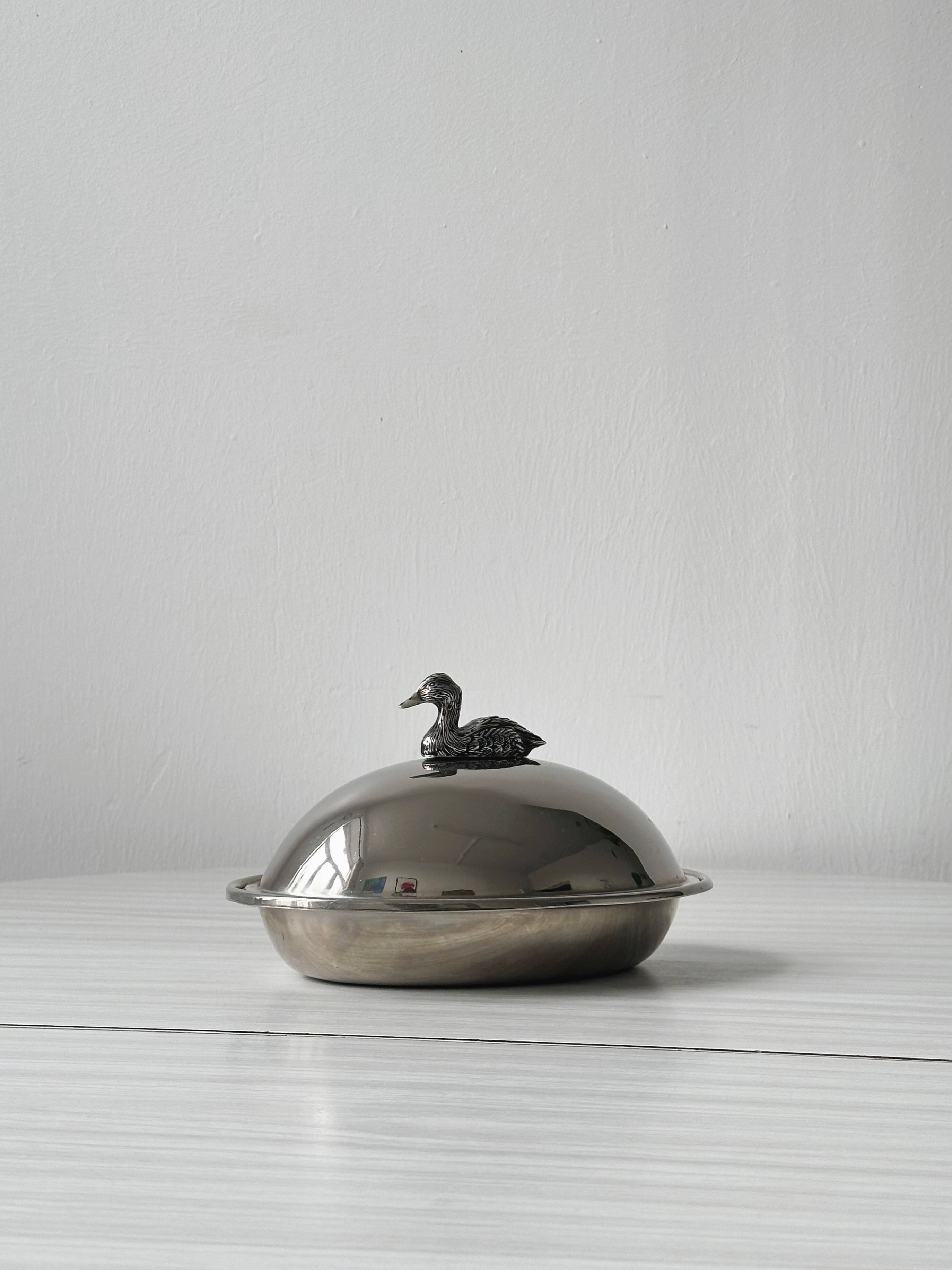 Foie gras display in stainless steel and silver metal.