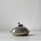 Foie gras display in stainless steel and silver metal.
