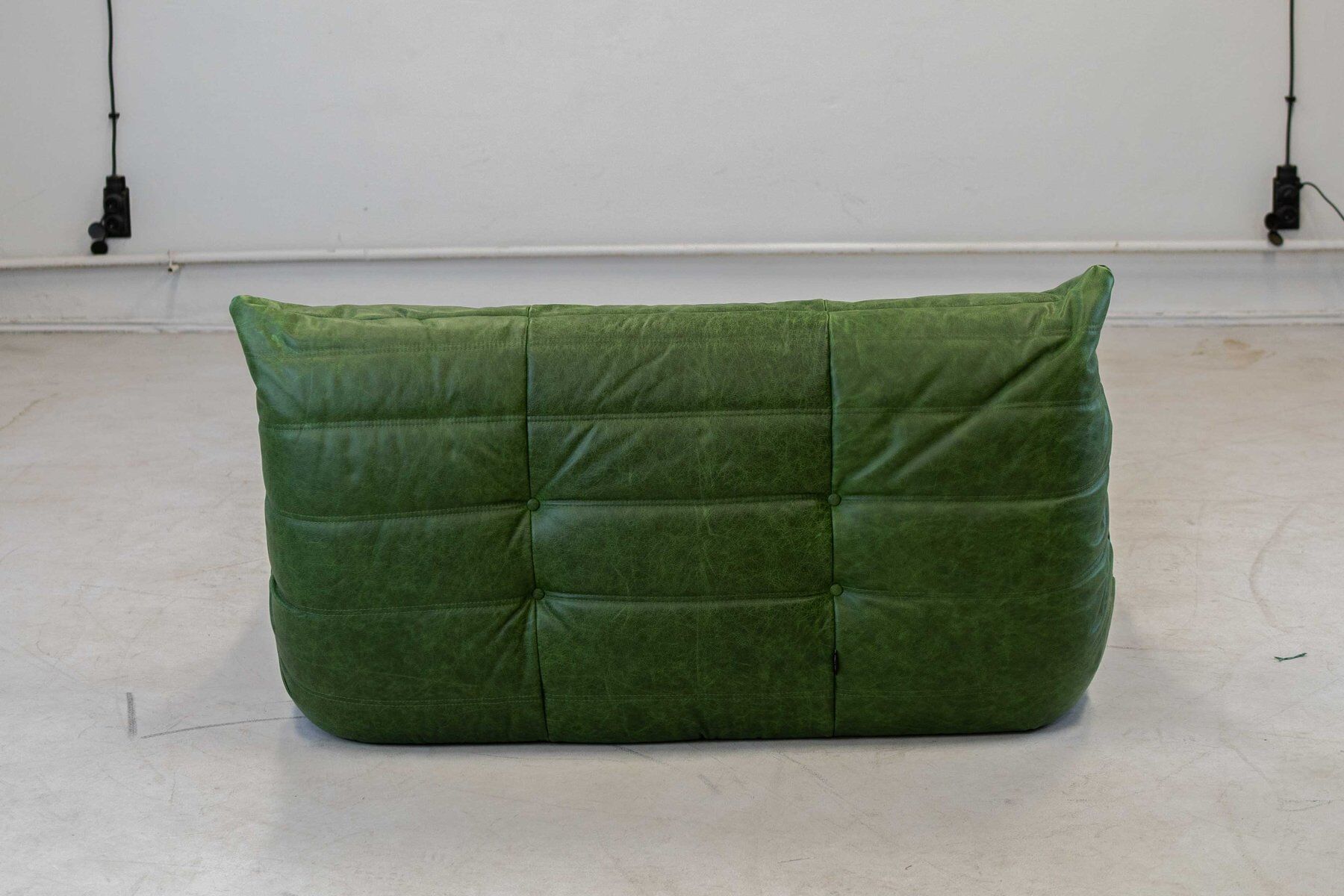 Togo chaise lounge in green leather attributed to Michel Ducaroy for Ligne Roset, 1974