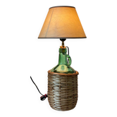 Lampe Dame-jeanne vintage en verre vert et rotin