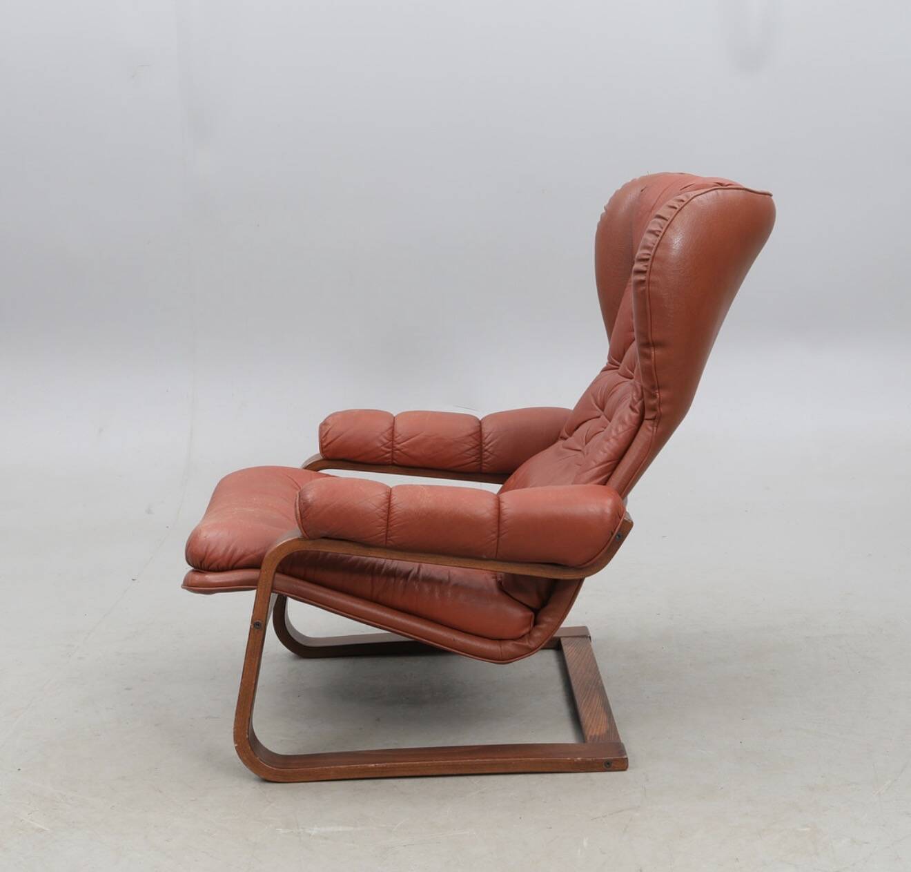 Sculptural Ear-Back Lounge Armchair — Moulded Wood — Deep Button