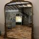 Large gilded mirror with pediment
