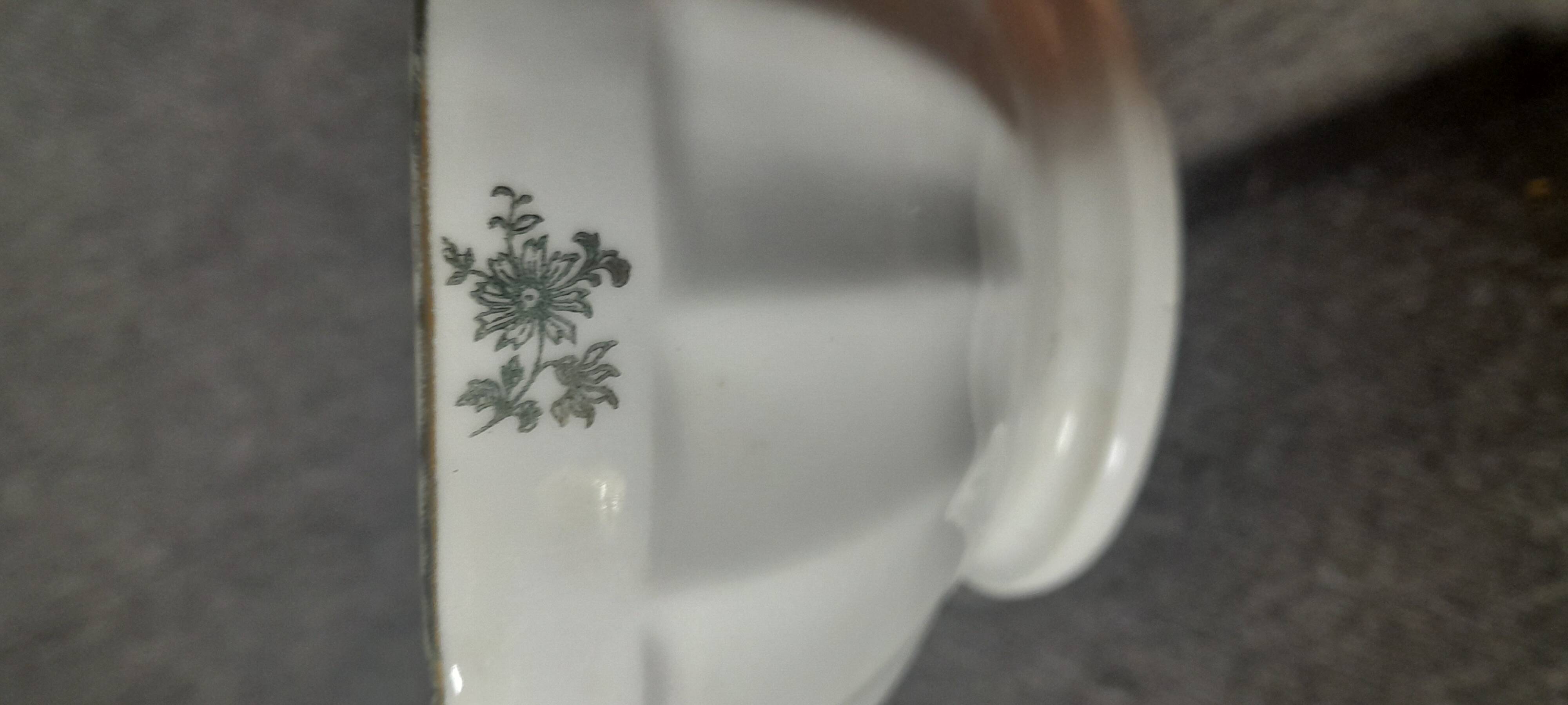White earthenware bowl with decorative flowers