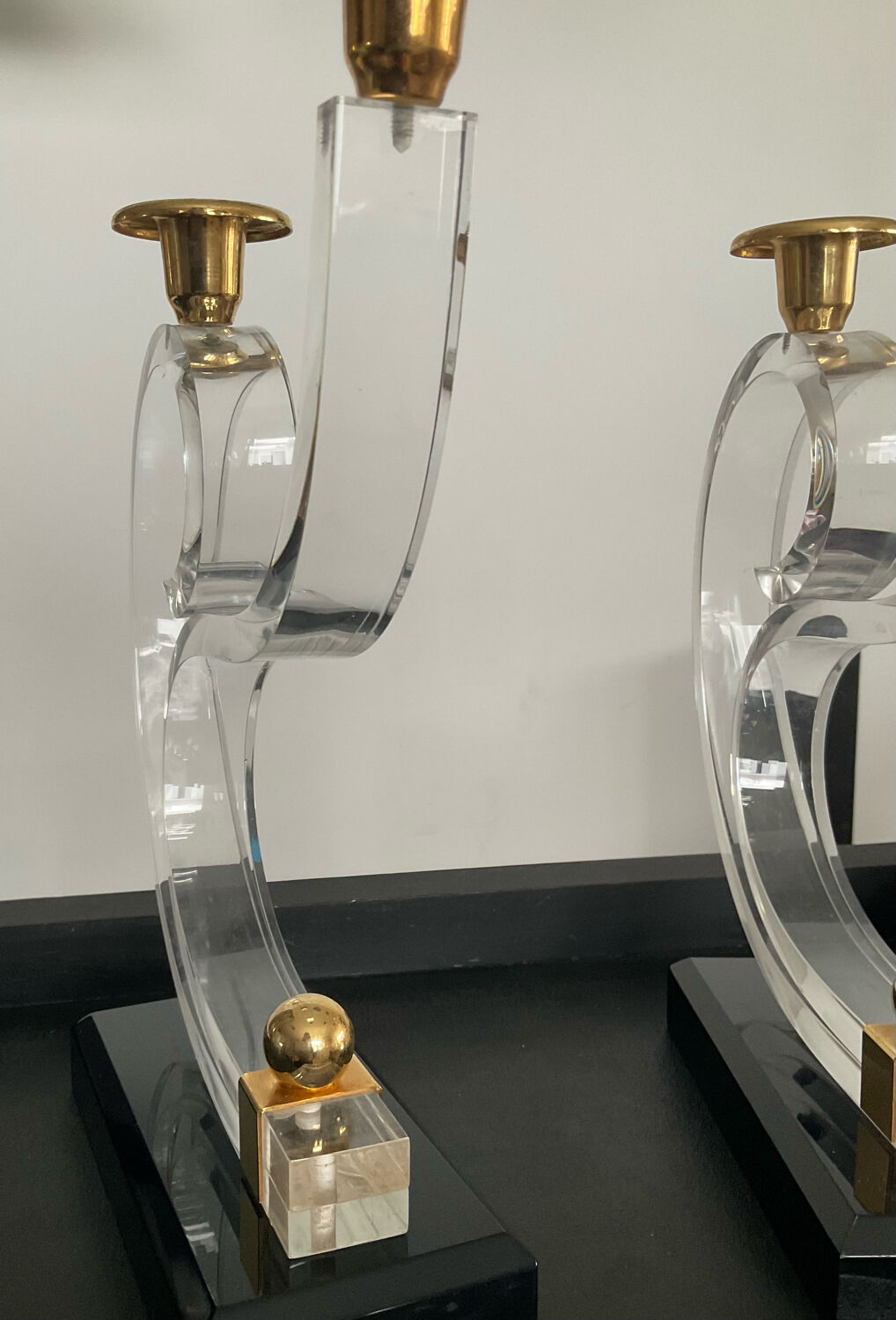 Pair of Hollywood Regency candlesticks in lucite and brass