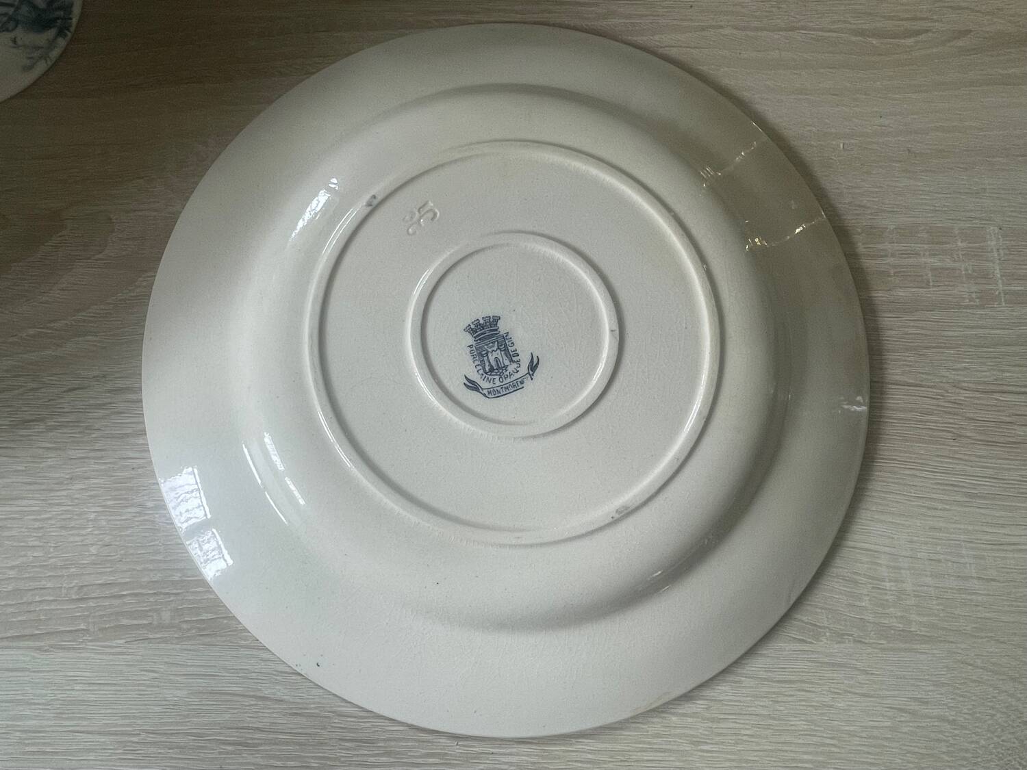 Old opaque porcelain dish from Gien, Montmorency model