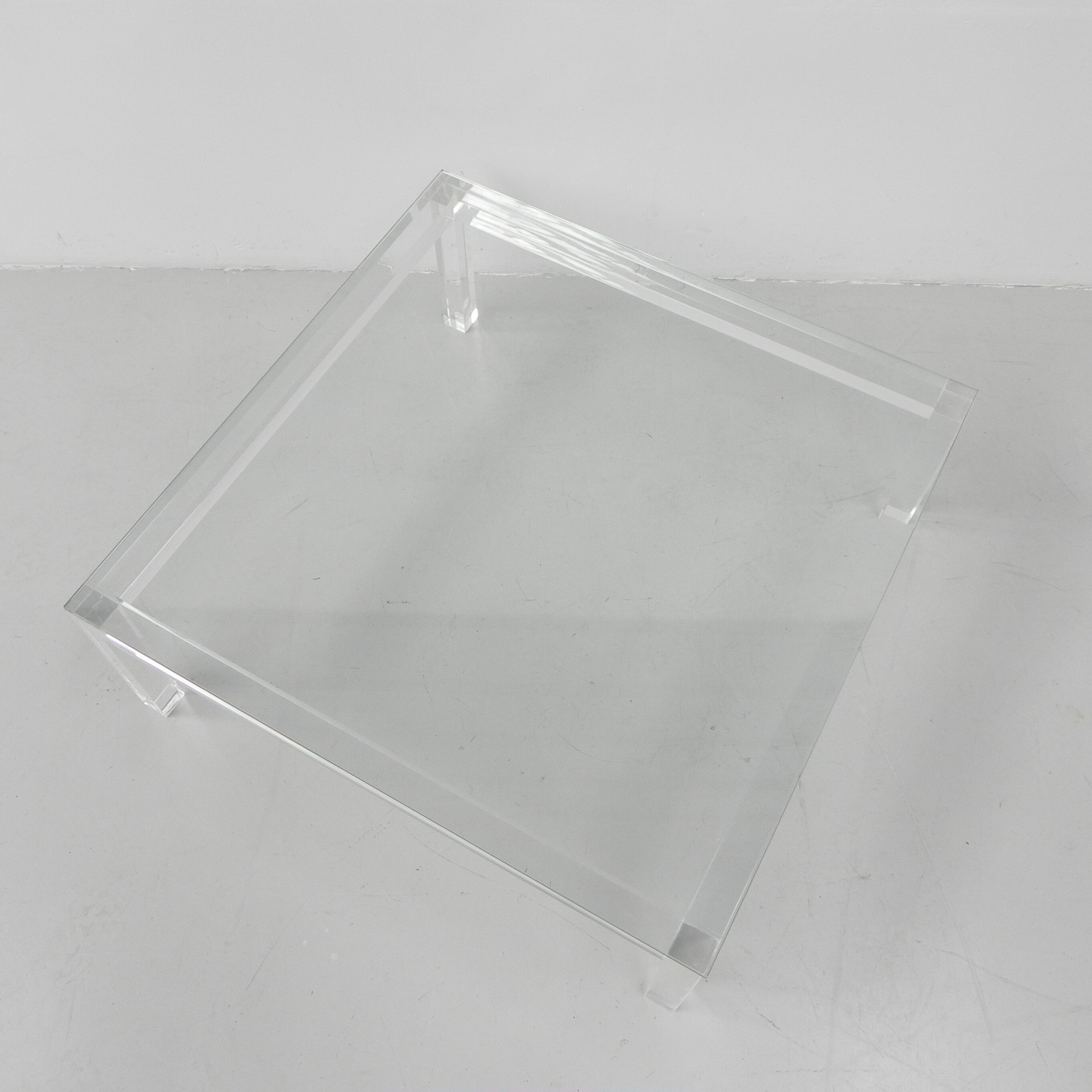 Vintage coffee table on perspex legs