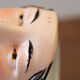 Tobacco pot woman's head in folk headdress