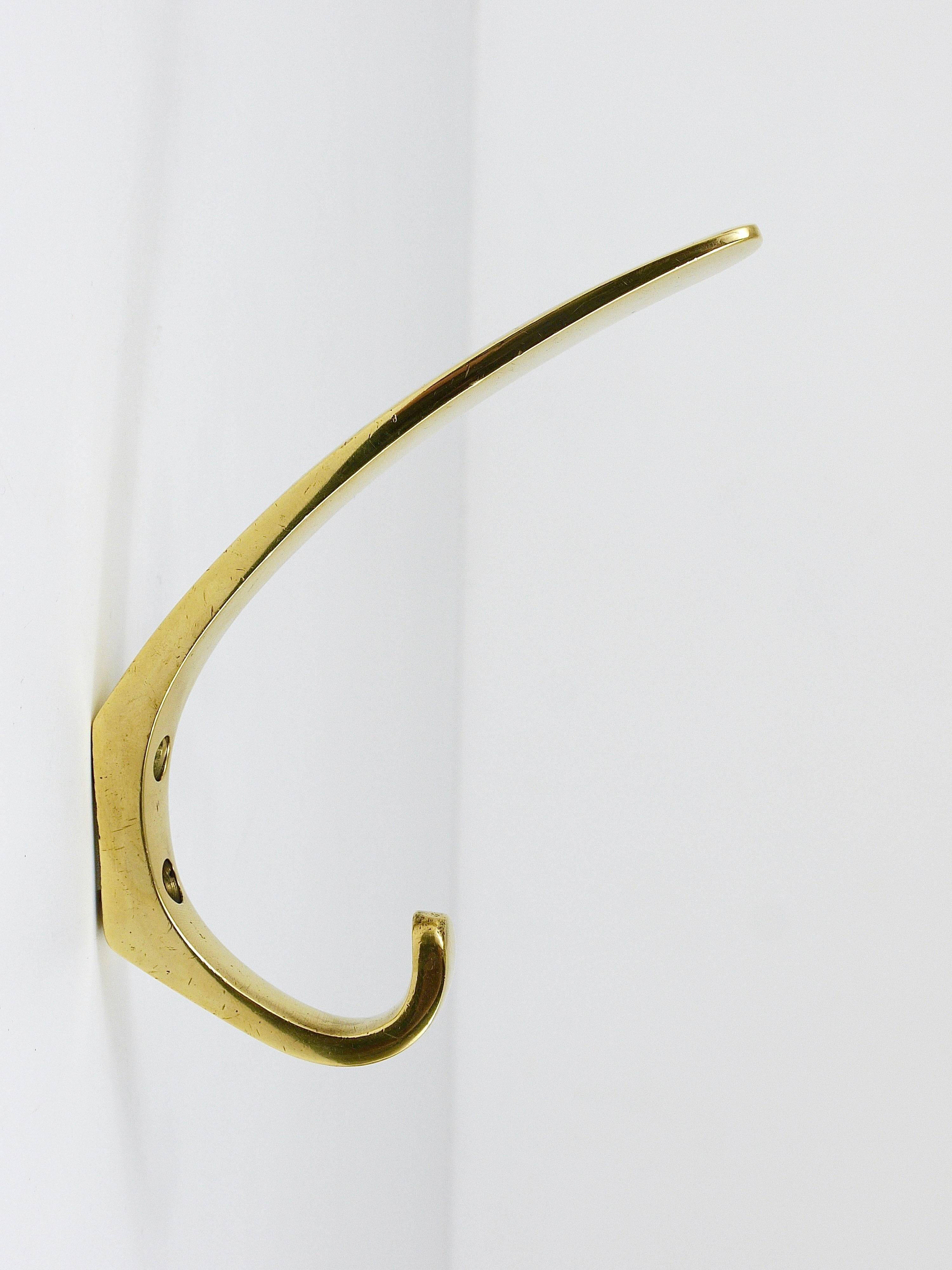 9 vintage brass wall hooks by Herta Baller, Vienna, Austria, 1950s.