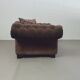 Large weighty love seat with the original matching cushions. Marked "Handmade in Holland"
