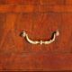 Antique mahogany chest of drawers with white marble.