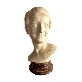 Plaster bust on marble stand