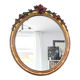 Miroir en bois doré avec fleurs