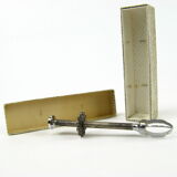 Sugar tongs in its case