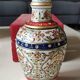 Hindu marble vase with floral decoration and gold leaf, in a box. Height 20 cm.
