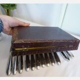 12 silver metal knives